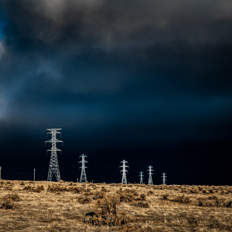 Canva – Electric Lines Over Cloudy Sky