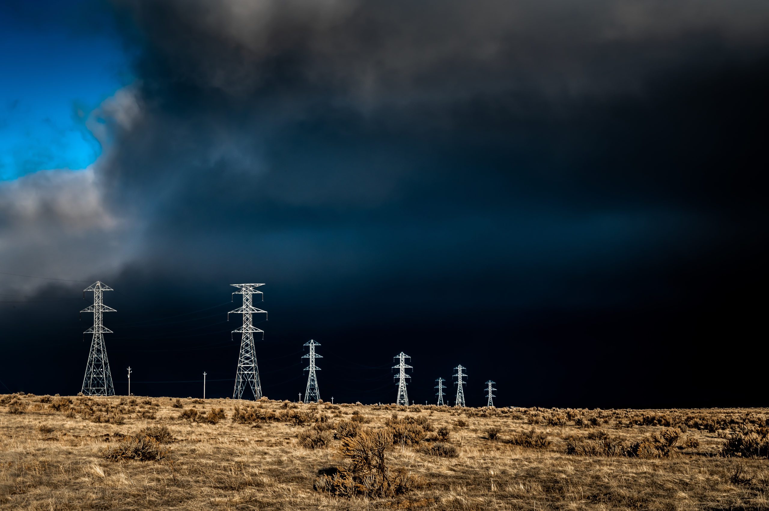 Canva – Electric Lines Over Cloudy Sky