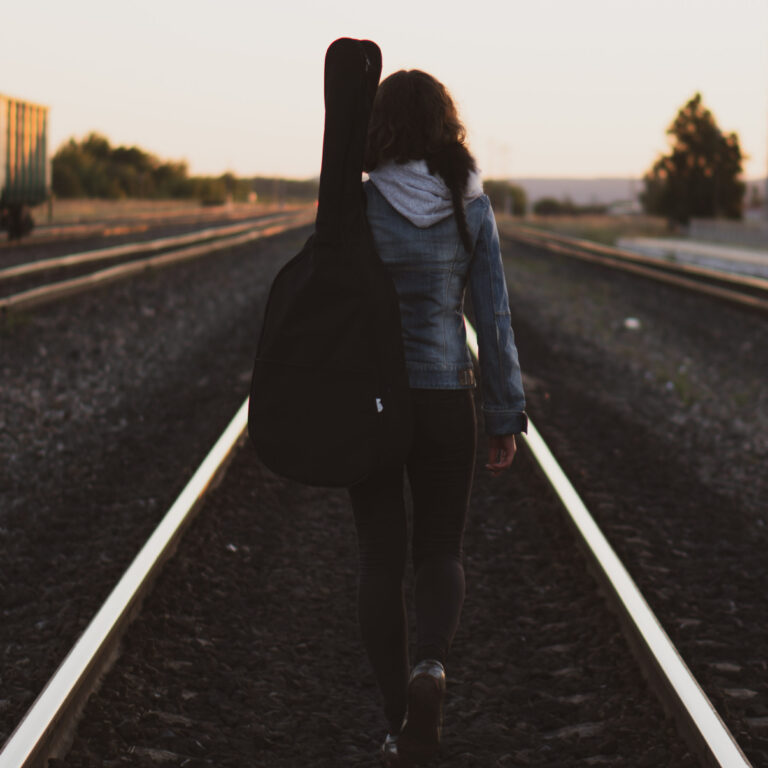 Canva – Woman Walking on Road