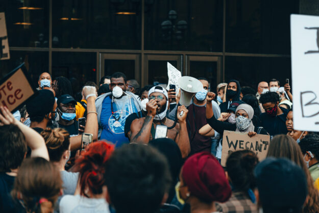 Canva – Crowd of Protesters Holding Signs